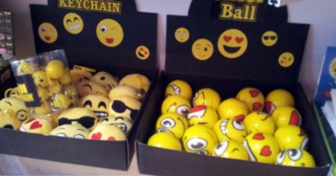 Promotional Emoji Products for Events A colorful array of emoji-themed promotional products displayed creatively.