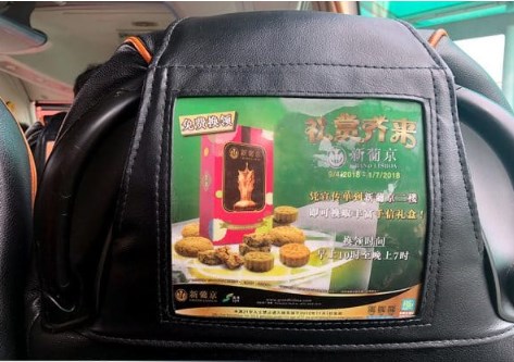 Custom Headrest Covers 1 Branded custom headrest covers displayed in a modern vehicle, enhancing corporate identity